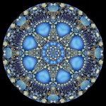 This dynamic fractal mandala with shades of blue, cyan, gold, beige, and brown is suggestive of the night sky and mysticism.