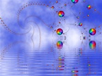 Another surreal balloon image. Here, a bevy of rainbow color balls are suspended over a tranquil lake, floating down to reflect in the rippled water.
